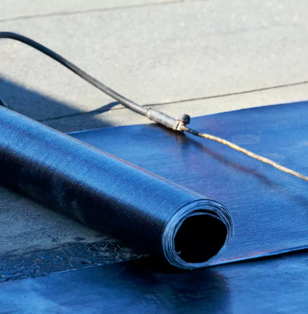 Expert Rubberized Roof Patch Solutions: Restoring Brenham's Flat Roofs to Peak Performance