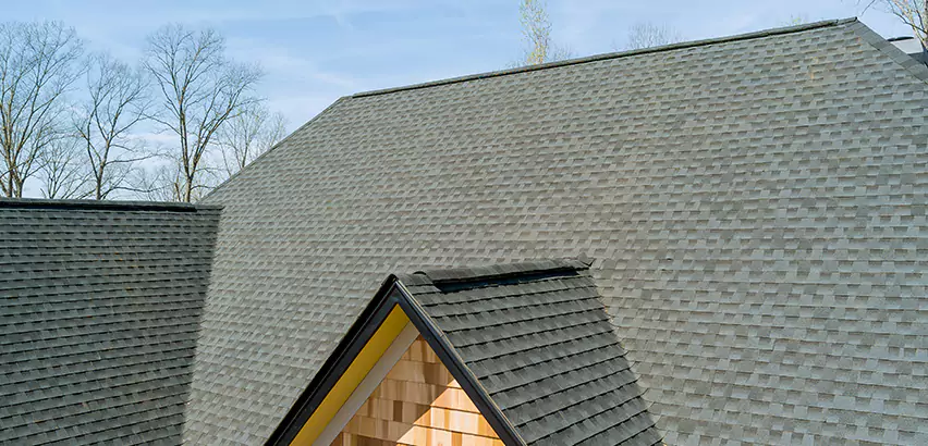 Replacing Vinyl Siding With Cedar Shingles in Brenham