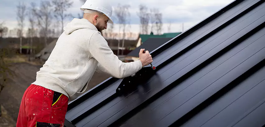 Tin Roof Ridge Cap Installation in Brenham